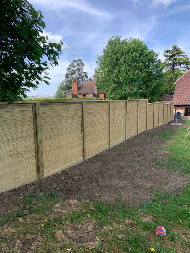 This is a photo of an acoustic fence installed by Fast Fix Fencing Cottenham